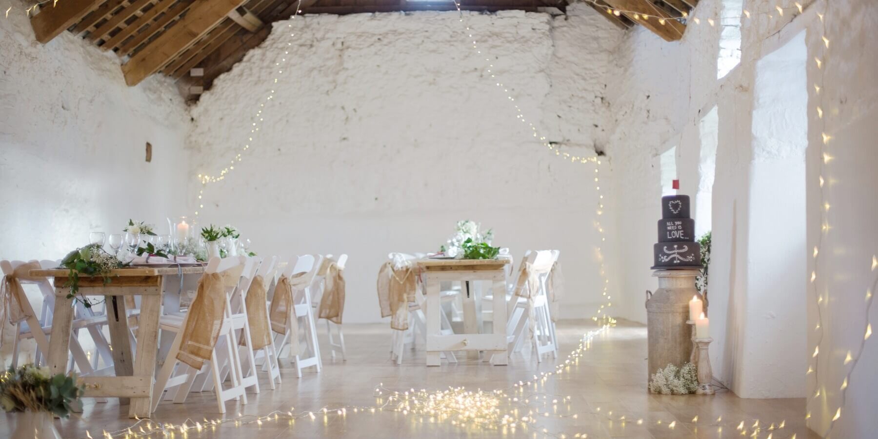 wedding venue devon clovelly barn lights