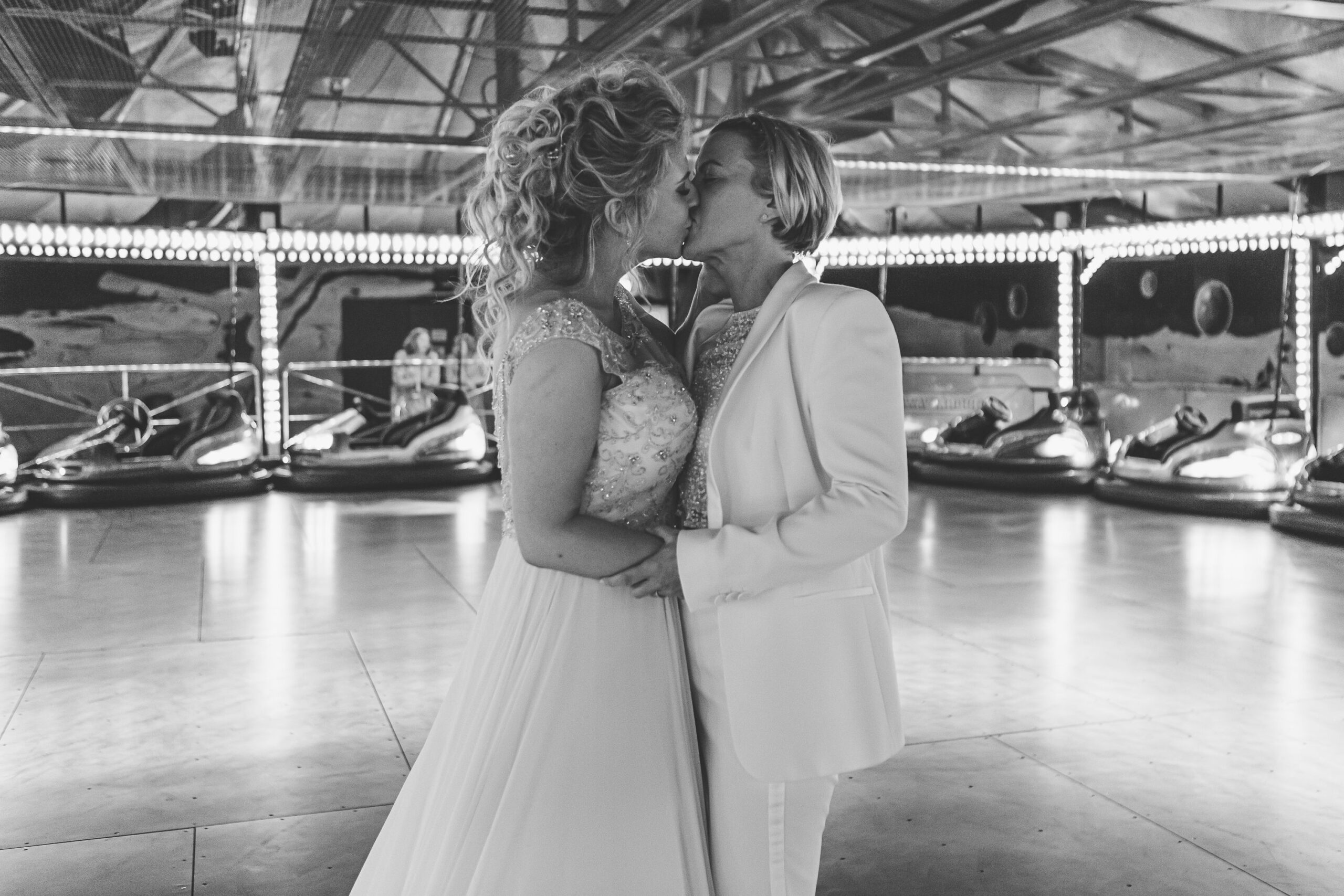 Devon wedding venue KG dodgems brides kiss