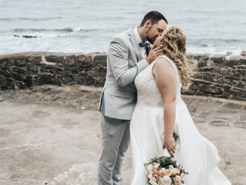 Dani and Phil wedding clovelly kiss